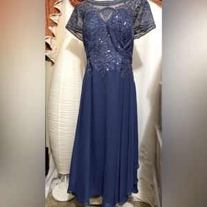 JJ’s House Navy Blue elegant cocktail laced dress with sequins.